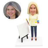 custom bobblehead figure female painter holding a paintbrush