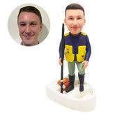 customised bobblehead figure man holding a fishing rod on a boat