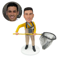 customized bobblehead figure man holding a fishing net