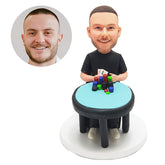 custom made bobblehead figure gamer playing cards at the table