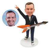 personalised bobblehead figure man making rock and roll gesture with a guitar