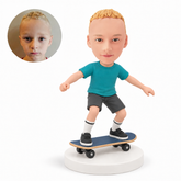 custom bobblehead figure young boy balancing on a skateboard