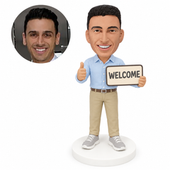 custom bobblehead figure man holding a welcome sign and giving a thumbs up