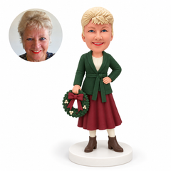 custom bobblehead figure woman holding a Christmas wreath