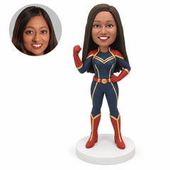 custom bobblehead figure woman in blue and red armor raising a fist