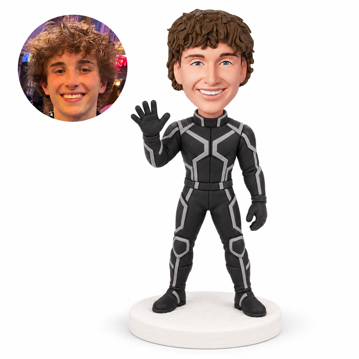 custom bobblehead figure man in a black patterned suit with an open hand