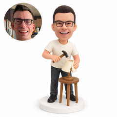 custom bobblehead figure man repairing a table lamp with a hammer