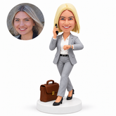 custom bobblehead figure businesswoman making a phone call while checking her watch