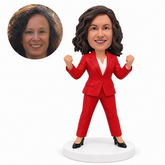 custom bobblehead figure businesswoman in a pantsuit celebrating with raised fists