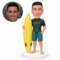 custom bobblehead figure male surfer in a short-sleeve wetsuit top with one hand in his pocket
