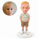 custom bobblehead figure boy in a striped polo shirt and shorts with both hands in pockets