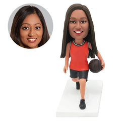 personalised bobble head figure female basketball player holding a basketball