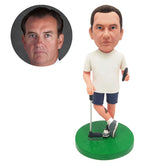 personalised bobblehead figure male golfer holding a golf club and a phone