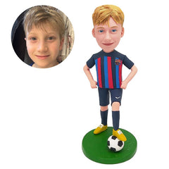 customised bobblehead figure soccer kid with one foot on the ball