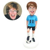 customised bobblehead figure female soccer player putting one foot on the ball