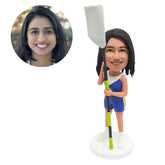 custom bobblehead figure rowing lady holding an oar