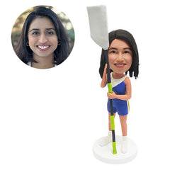 custom bobblehead figure rowing lady holding an oar