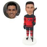 customized bobblehead figure hockey player holding a hockey stick