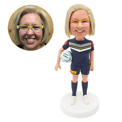 personalized bobblehead figure female soccerl player holding a ball