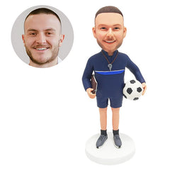 personalized bobblehead figure male soccer coach holding a football and a notebook