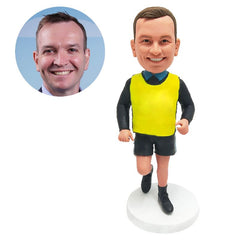 personalised bobble head figure male coach running in a fluorescent vest