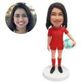 custom made bobble head figure female player holding a ball
