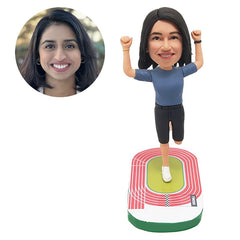 personalized bobble head figure female runner with hands up on the playground