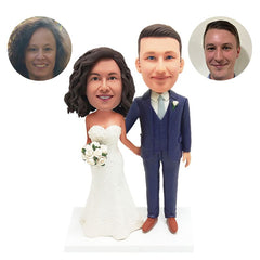 personalised bobble heads figures wedding couple arm in arm holding flowers