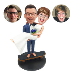 custom made bobble heads figures wedding couple carrying the bride on the skateboard