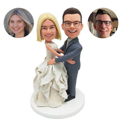 personalised bobble heads figures wedding embracing couple wedding cake topper