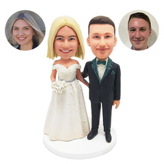 customized bobblehead figure wedding cake topper