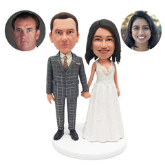 custom made bobbleheads figures couple holding hands wedding cake topper