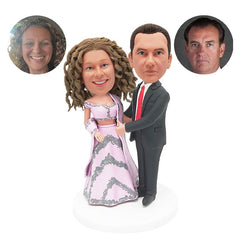customised bobble heads indian wedding couple with arms acrossed each other