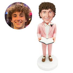 custom made groomsman bobble head marriage celebrant host holding a book