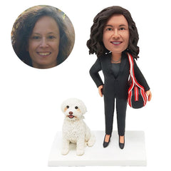 customised bobblehead figure lady holding a bag with a pet