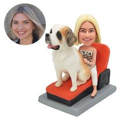 customized bobblehead figure lady sitting on the sofa with a bit dog
