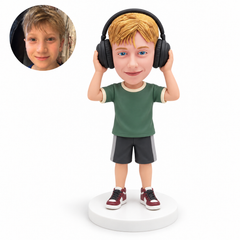 custom bobblehead figure boy wearing headphones with both hands raised beside the earpieces