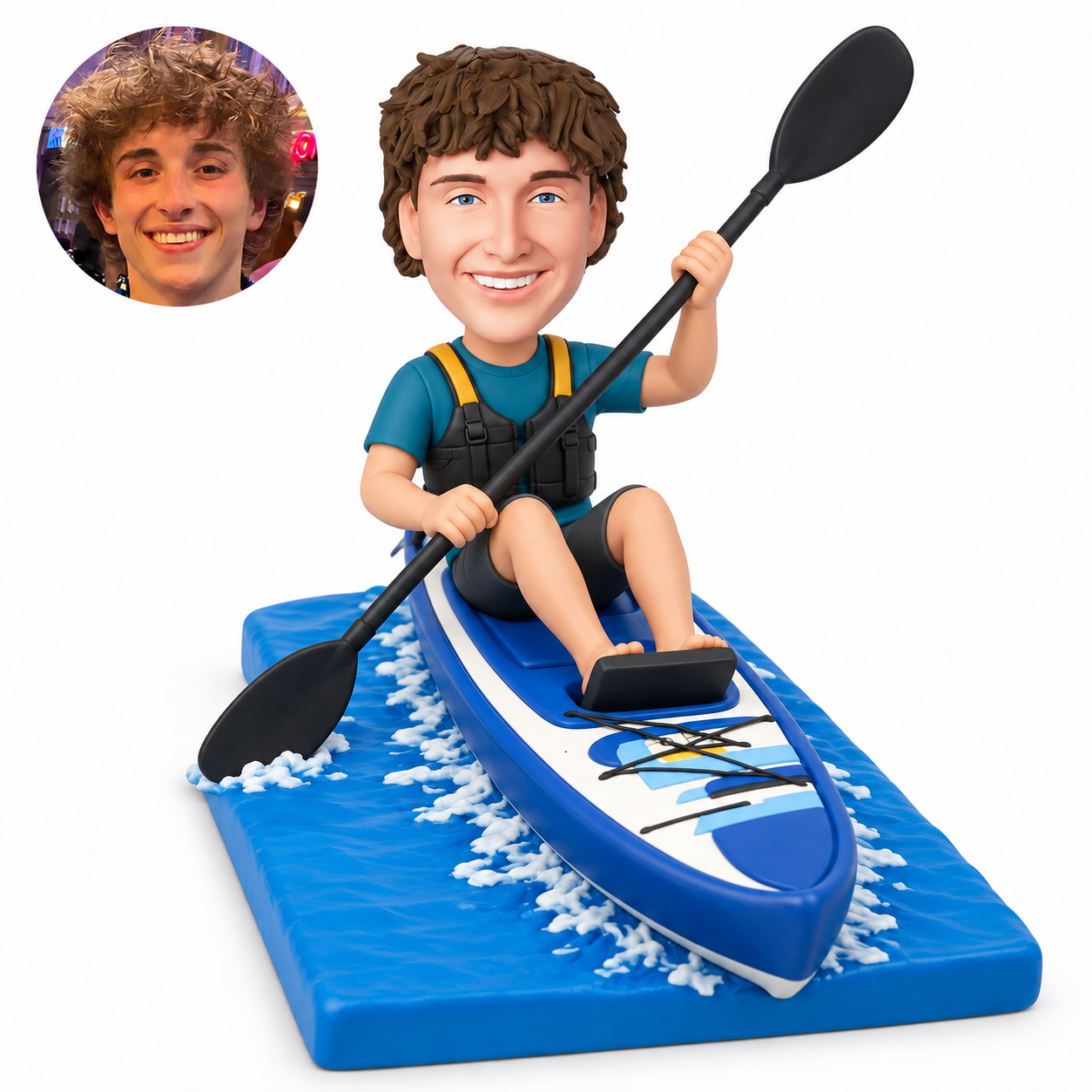 custom bobblehead figure male kayaker raising a double-bladed paddle in a touring kayak