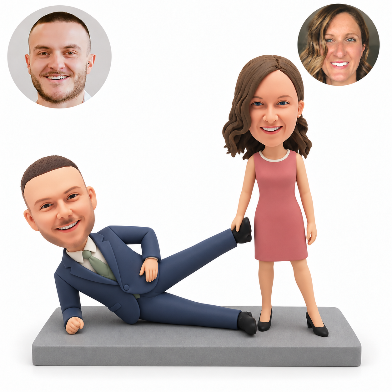 custom bobblehead figures couple with the man reclining on one elbow and the standing woman holding his raised ankle