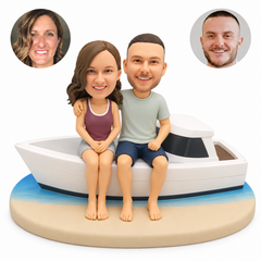 custom bobblehead figures casual couple seated side by side on the edge of a fixed yacht