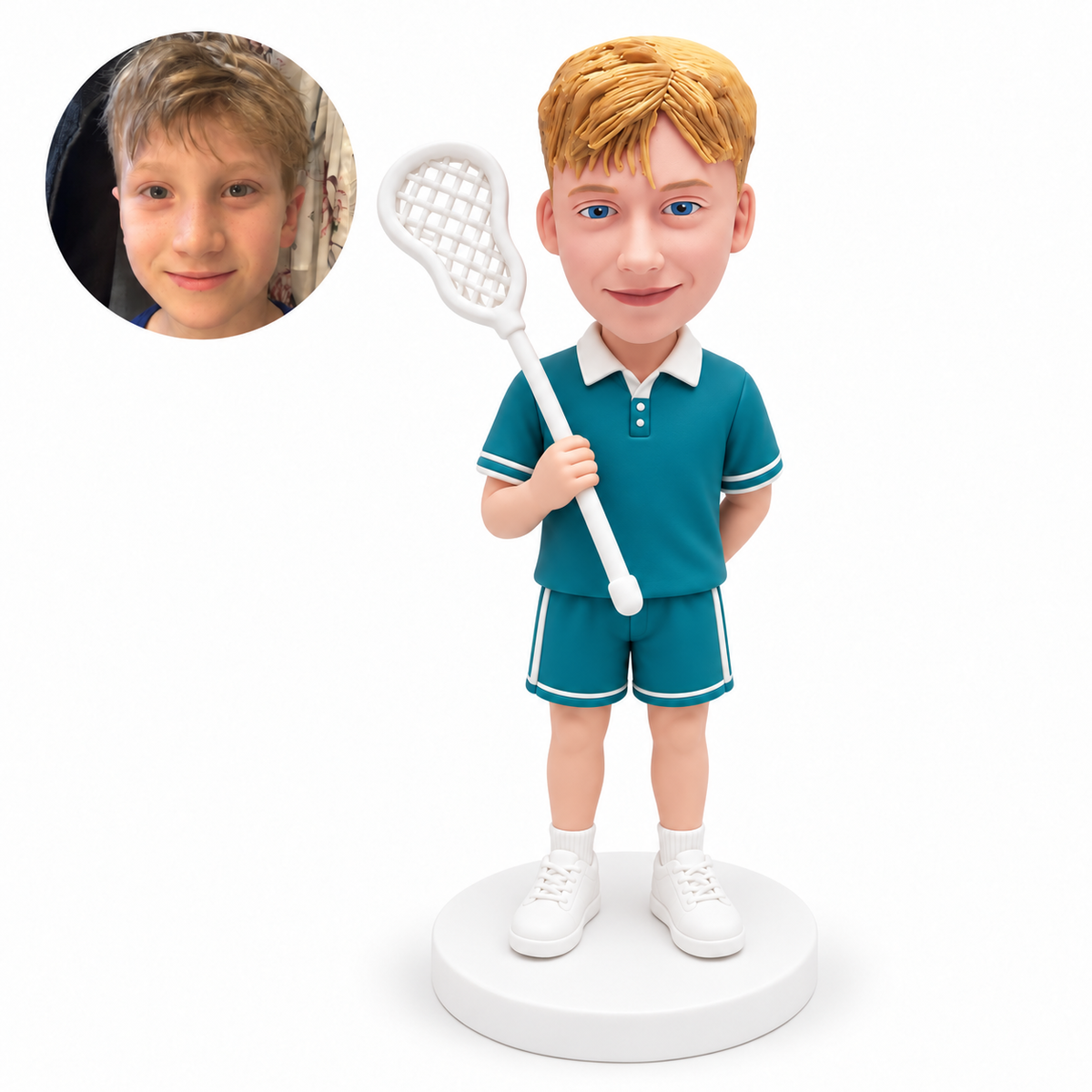 Boy lacrosse player holding one upright white stick with his opposite arm resting behind his back.