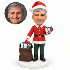 custom bobblehead figure male Santa holding two small gifts beside an open sack of presents