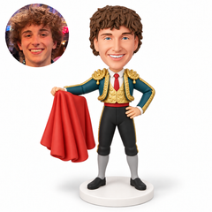 custom bobblehead figure male matador holding a red cape in his right hand with his left hand on his hip