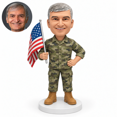 custom bobblehead figure male soldier holding an American flag in his right hand with his left hand on his hip