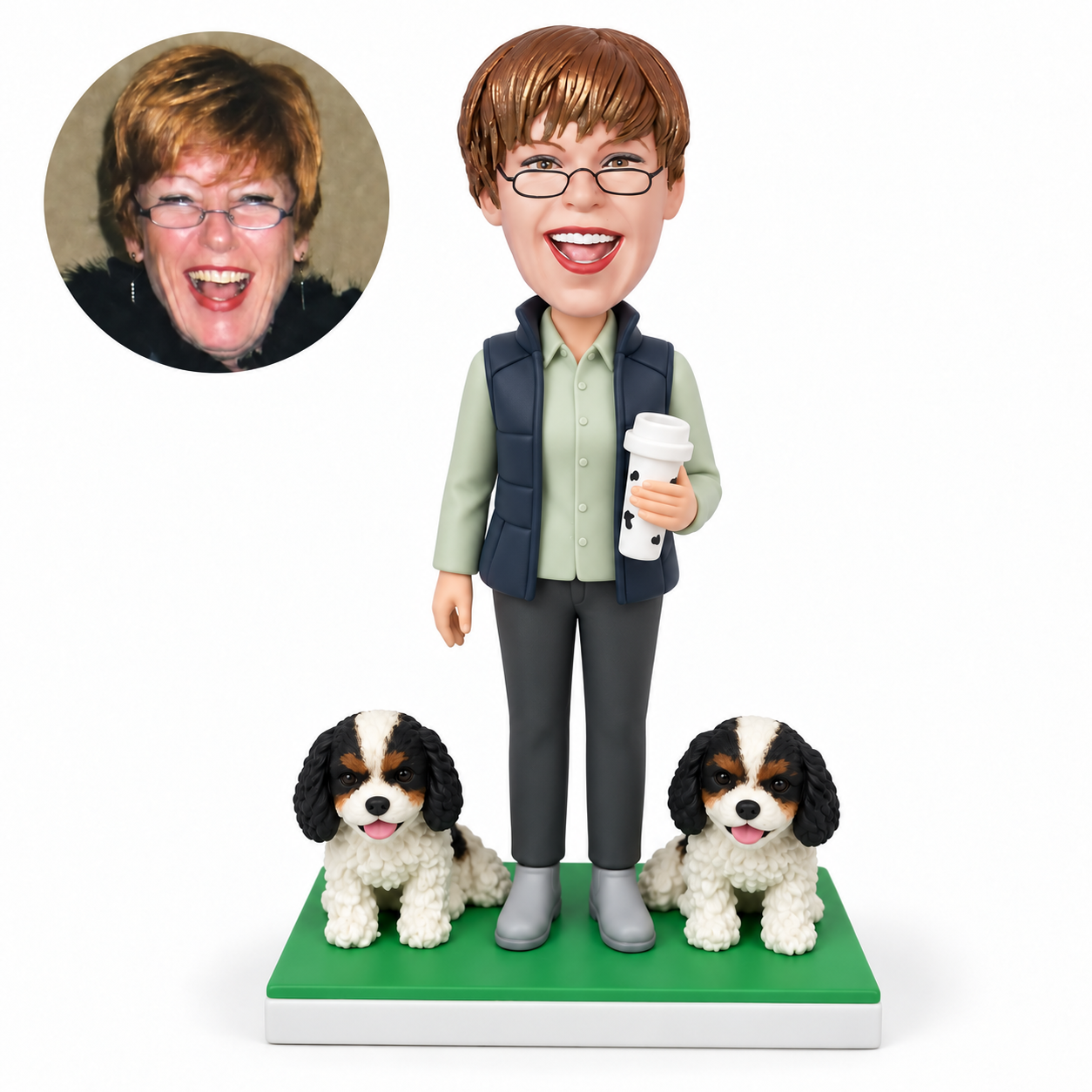 custom bobblehead figure woman holding a travel cup in her left hand beside two small sculpted dogs