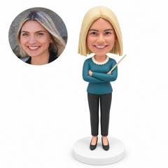 custom bobblehead figure woman standing with crossed arms holding a diagonal pointer