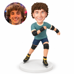 custom bobblehead figure male skater wearing protective pads with one arm across his chest and the other extended behind