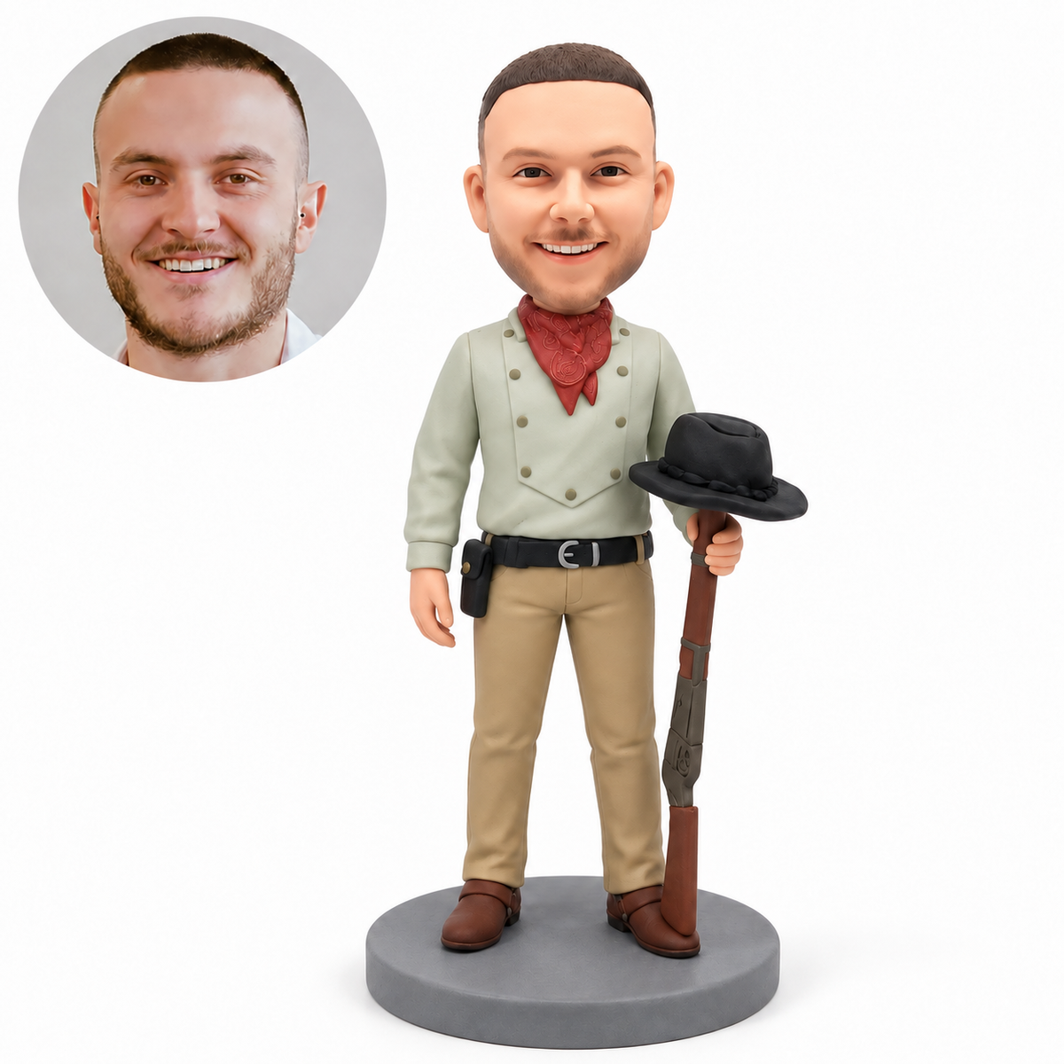 Custom male hunter bobblehead standing with a grounded decorative long rifle and wide-brim hat