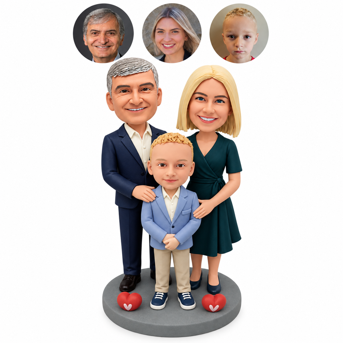 custom bobblehead figures parents placing hands on their son with two heart ornaments