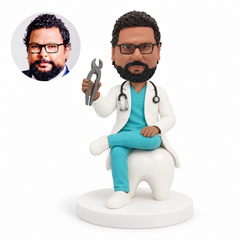 custom bobblehead figure male dentist seated on a giant tooth model